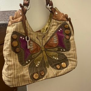 Fossil butterfly purse